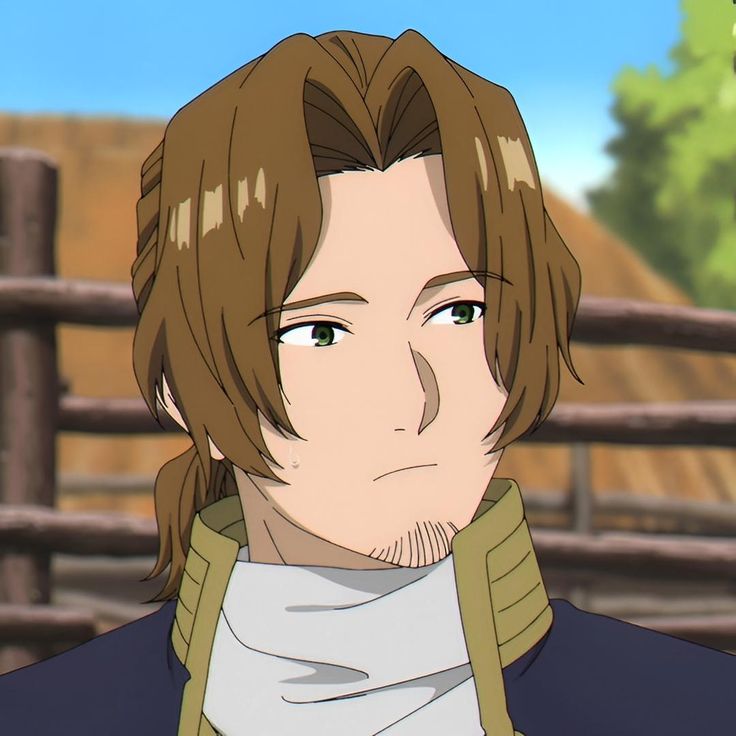 the image shows the face and shoulders of a young man from an anime. he has brown hair pulled back in a low ponytail, green eyes, and a goatee. he appears to be wearing a dark blue jacket with gold trim over a white shirt. the background suggests he is outside during the day. the lighting is soft, and the perspective is at eye level.