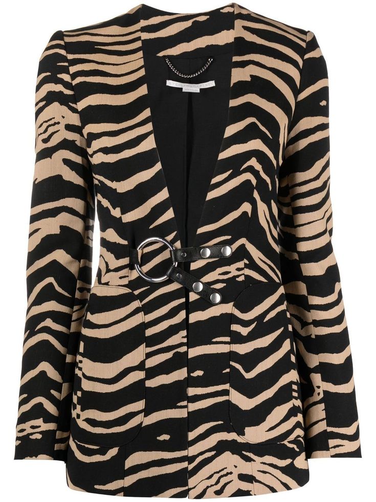 a zebra print blazer with a black lining and oring buckle.