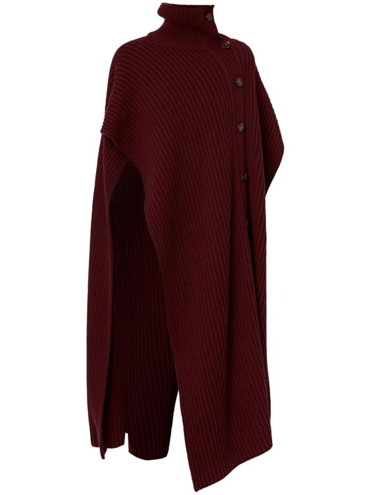 a burgundy knit sweater with a turtleneck and long sleeves. the sweater has buttons down the front and a capelike design. it is a casual and comfortable sweater that is perfect for fall or winter.