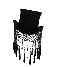 a black top hat with a lace and beaded fringe. the hat is made of felt and has a wide brim. the fringe is made of black beads and tassels. the hat is a stylish and elegant accessory for any occasion.