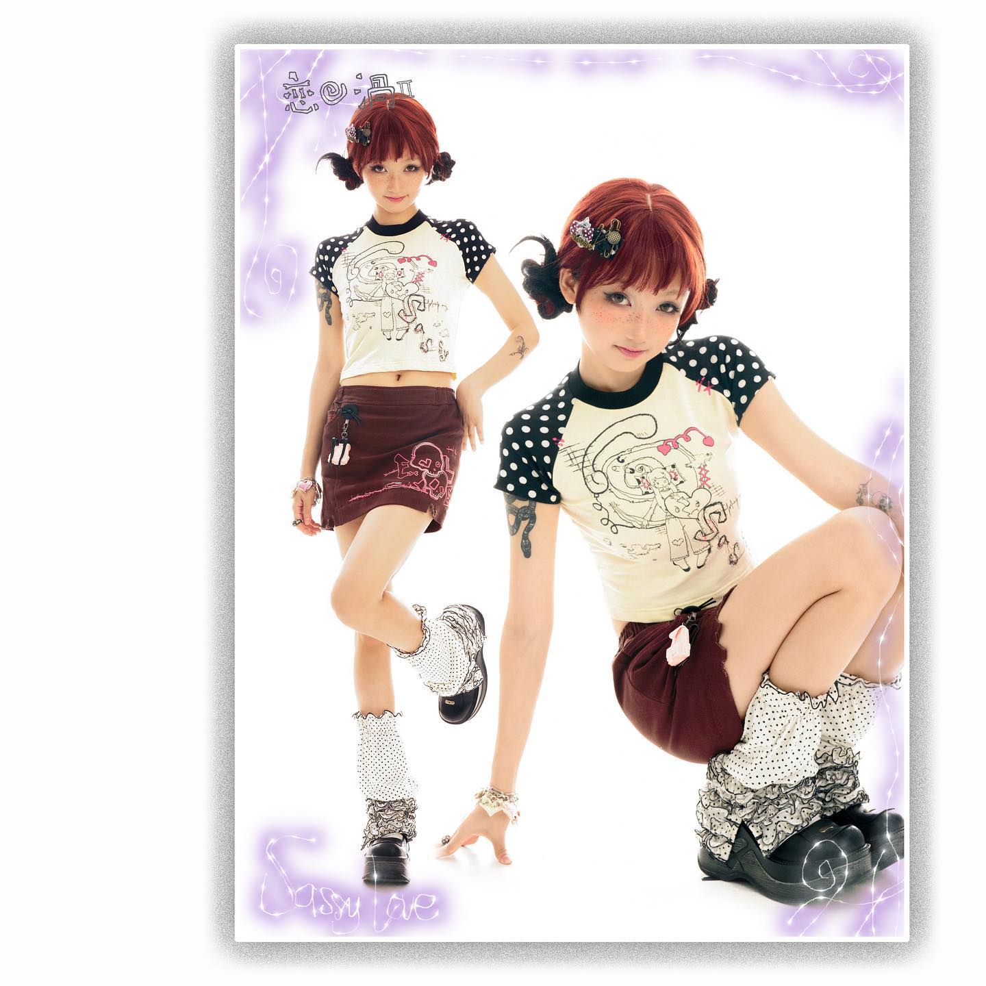 the image showcases a fashion photoshoot featuring a young woman modeling a complete outfit from the brand "sassy love." the style is strongly reminiscent of japanese lolita fashion, blending cute and whimsical elements with a touch of sophistication. the model is shown in two poses. she wears a creamcolored top with a cartoon print paired with a brown miniskirt, both adorned with delicate details.  she also wears polkadot kneehigh socks and dark colored shoes, accessorized with bows or frills on the socks. the model's hair is styled in a bob with bangs. the background is plain white, highlighting the details of the clothing and the model's poses. the overall aesthetic is youthful, playful, and distinctly japaneseinspired fashion.
