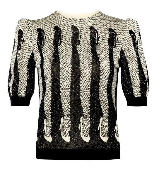 the image shows a black and white patterned women's shirt with short sleeves. the pattern consists of vertical stripes with images of women's legs and shoes.