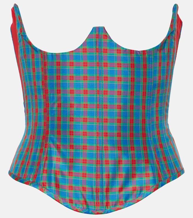 a plaid patterned corset with a red lining is pictured on a white background. the corset has a rounded bottom, with a cut out top and two upwardpointing straps that are also lined with red fabric. the corset is red, blue, and purple plaid.