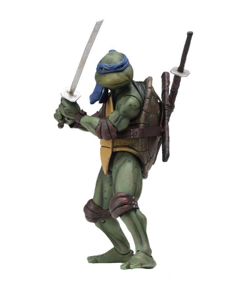 this is a 1/4 scale action figure of leonardo from the 1990 teenage mutant ninja turtles movie. he's holding a katana in his right hand, and there's another katana on his back, along with a sheath.  the figure is made of plastic and is highly detailed, capturing the likeness of leonardo from the movie.