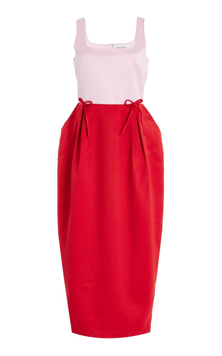 a red and pink sleeveless midi dress with a square neckline. the dress is aline with a full skirt. the dress is perfect for a summer party or casual day out.