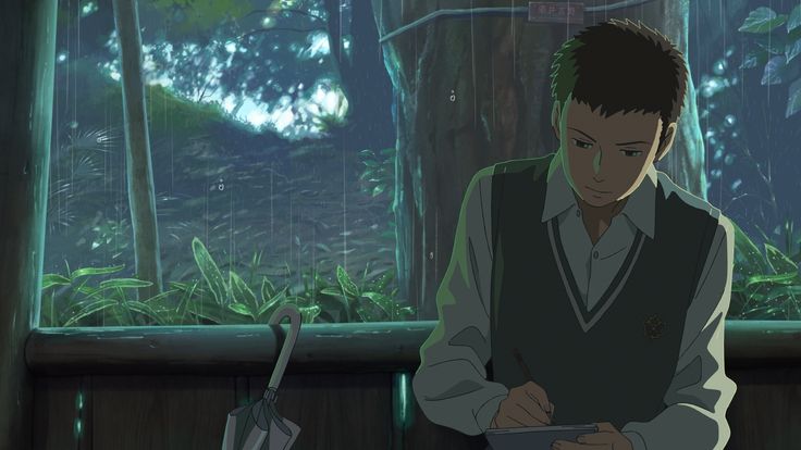 a young male anime character is sitting at a wooden table in a dark room with rain falling outside the window. he is writing in a notebook. there is a large green umbrella on the table beside him.