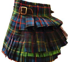 a closeup shot of a mini kilt with a blue, green, red, and yellow tartan pattern, featuring a ruffled bottom and a belt.  the kilt is pleated and shows the detail of the material. the skirt is  a traditional scottish garment.