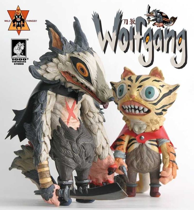 this image shows two toy figures, a wolflike creature and a catlike creature, from the "wolfgang" series by 1000 tentacles studio. the wolflike figure is grey and black with a white patch on its chest and a black cape. it has sharp fangs and claws. the catlike figure is yellow and white with brown stripes and a red cape. it has big, bright blue eyes and a playful expression. both figures are holding knives.  the image is set against a white background.