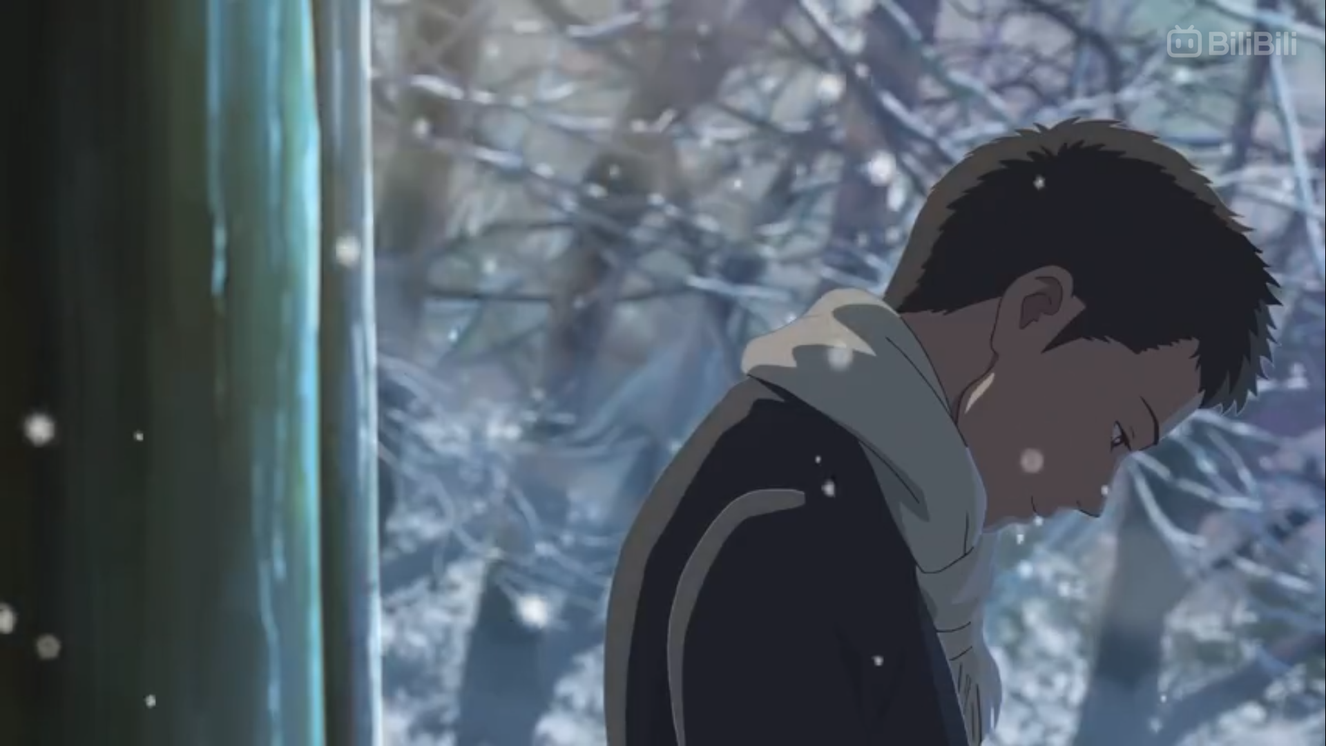 a lone anime boy stands in a snowy forest, looking down at his feet. he wears a jacket and a scarf, and his hair is dark. the scene is set in winter and the weather is cold. the boy appears sad and lonely.