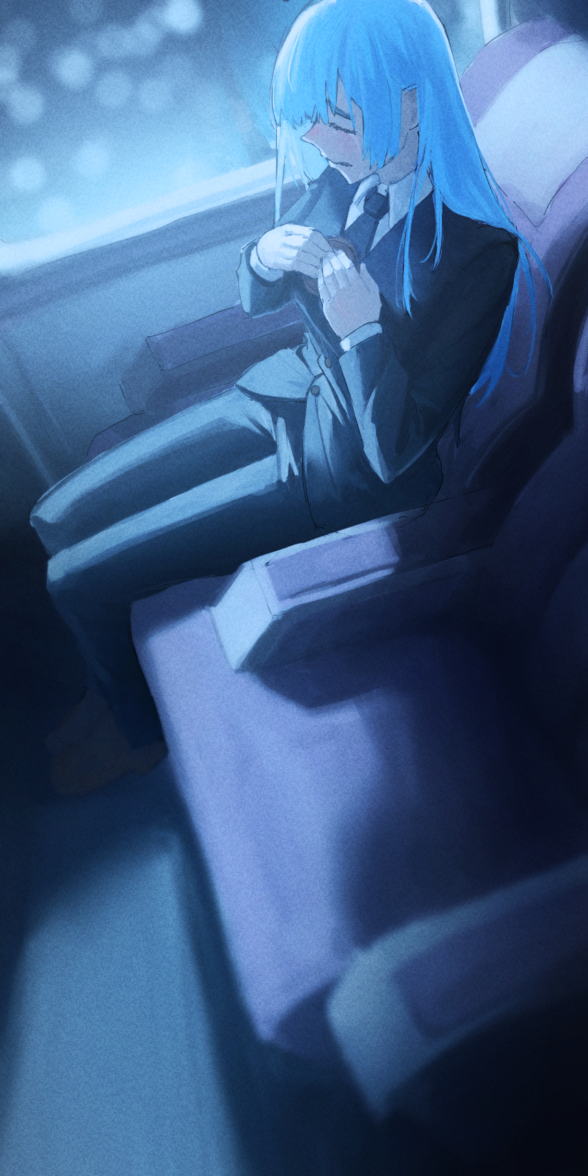 the image shows a young woman with long blue hair sitting alone in a train seat at night. she is wearing a dark suit and appears to be crying, with her hands clasped together. the lighting is dim and predominantly blue, reflecting the somber mood of the scene. the high angle perspective emphasizes her isolation and vulnerability.