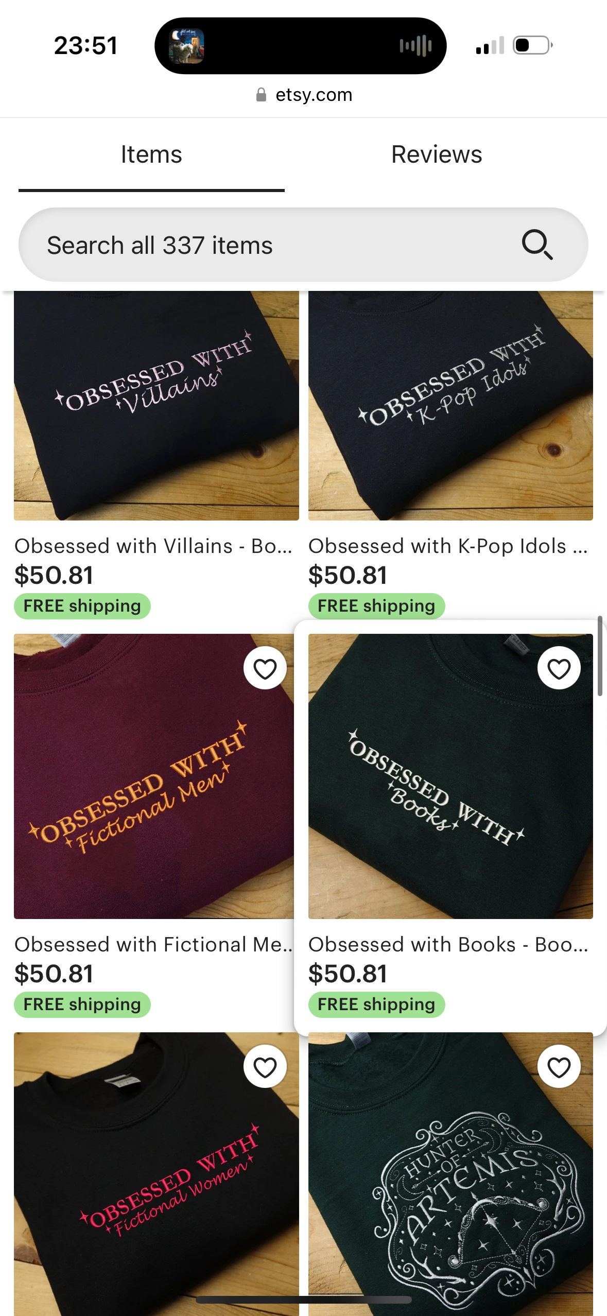 this image shows a variety of tshirts and sweatshirts, all with a similar design: a white text print that reads "obsessed with" followed by a theme, such as "villains", "fictional men", "kpop idols", etc. the shirts are displayed in a grid format and are priced at $50.81 each.  each tshirt has a small heart icon in the top right corner.  this image is most likely from an online store.