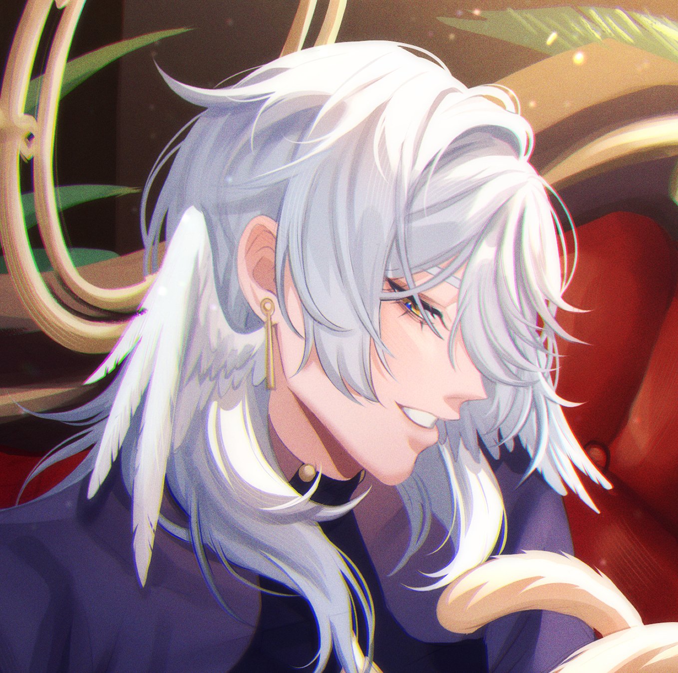 the image shows a closeup of an anime male character with white hair. he is wearing a purple shirt and has golden earrings. his wings are visible behind him and he is smiling. he is sitting on a red couch.