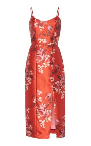 a red floral midi dress with a slit.