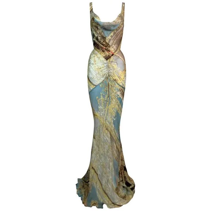 a sleeveless, fulllength gown with a cowl neck. it features a complex pattern in shades of gold and blue. the gown is formfitting and has a slightly flared hem.