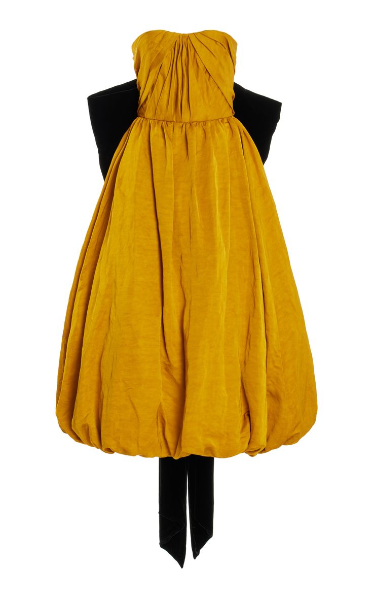 a yellow strapless dress with a black bow belt and a black bow at the back. the dress is a puffy style and is perfect for a formal event.
