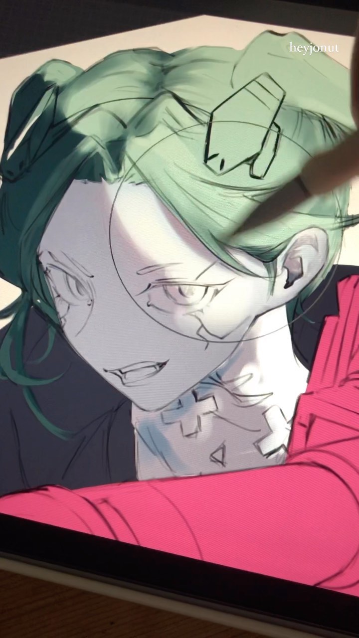 the image shows a closeup view of a digital artist's work in progress on a tablet.  the artwork depicts a stylized female anime or manga character with vibrant green hair styled in a complex updo, and wearing a bright pink jacket or top.  the artist is using a stylus, and parts of the drawing are still in a lineart/sketch phase while others are already colored and shaded. the character's expression is somewhat serious or intense, and the overall style is expressive and graphic.  the artist's handle, "heyjonnut," is visible in the upper right corner. the image shows the artist's hand and a portion of their tablet and workspace.