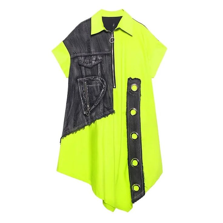 an asymmetrical dress with a shortsleeved design. one side of the dress is bright neon green, while the other side features a panel of denim fabric. the denim panel has pockets and a zipper detail. the neon green side has a strip of denim fabric with grommets. the dress has a collared neckline and a zipper that runs from the collar to the top of the denim panel.
