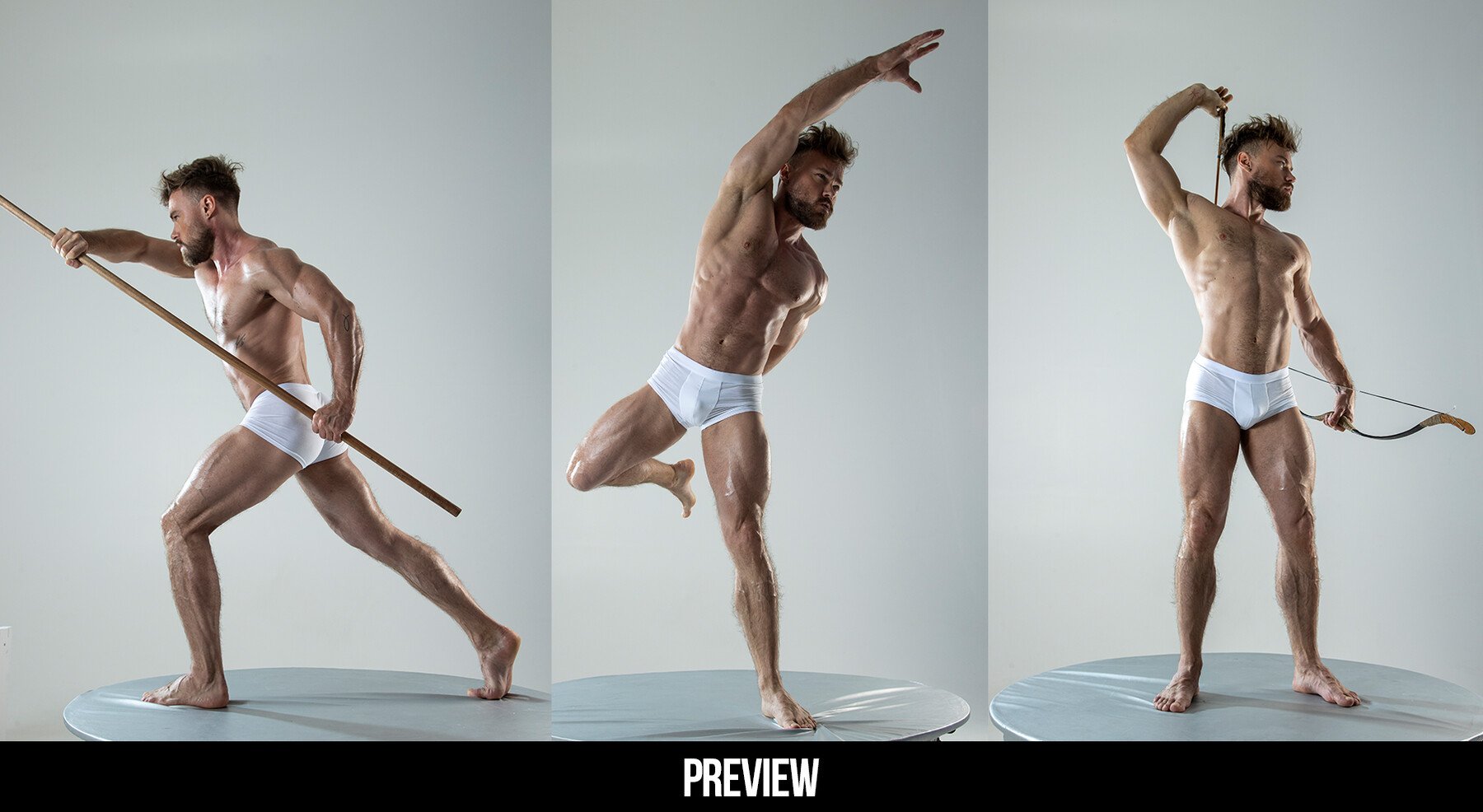 a muscular man poses in three different positions. in the first position, he is holding a spear in his hands, in the second, he is standing with one leg up and arm out, and in the third, he is holding a bow and arrow. he is wearing white underwear and is standing on a gray platform in a studio setting. the background is white.
