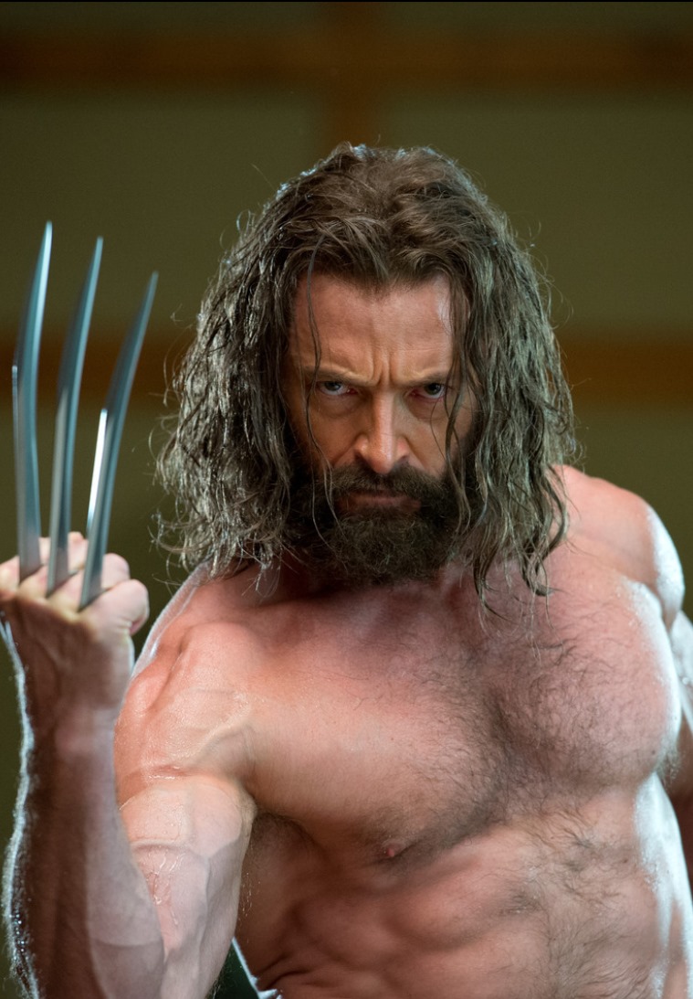 a shirtless hugh jackman as wolverine poses with his signature claws, displaying a fierce expression and muscular physique. he has a long beard and wetlook hair.