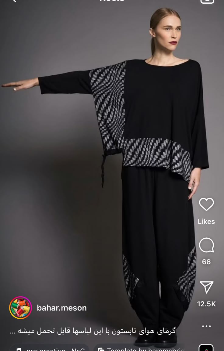 a woman is posing for a photo while wearing a black longsleeved shirt and matching pants with a distinctive pattern. the outfit has a casual, yet elegant look, and the woman's pose conveys confidence.