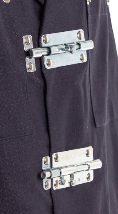 a blue shirt with two metal latches fastened down the front.