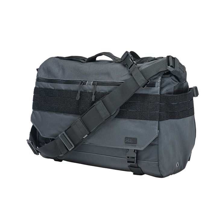 a gray and black 5.11 tactical messenger bag with molle webbing and a shoulder strap. the bag is made of durable, waterresistant materials.