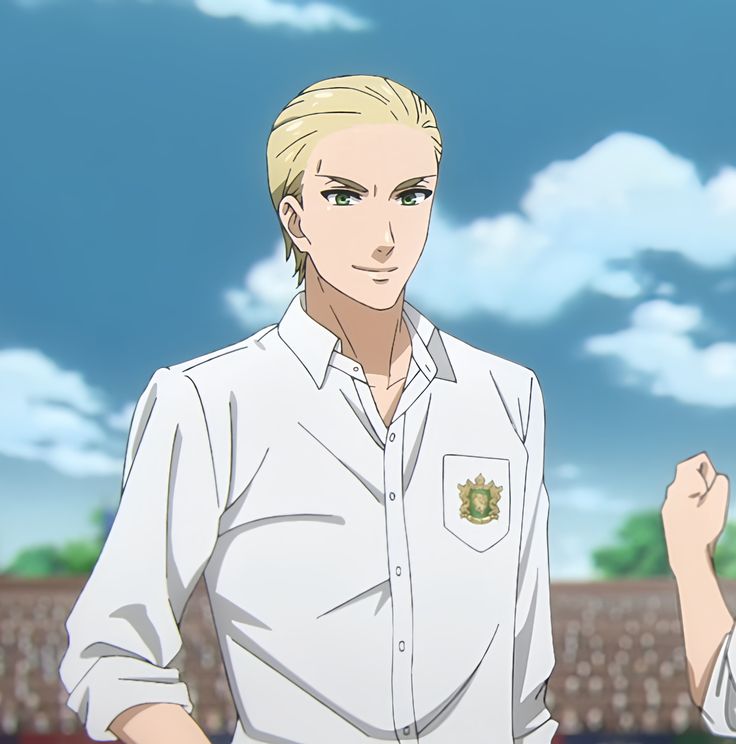 this is an image of a blondhaired anime boy in a white shirt with a green crest on the pocket, standing in a stadium and looking away from the camera with a smile on his face. there are blue skies and white clouds behind him.