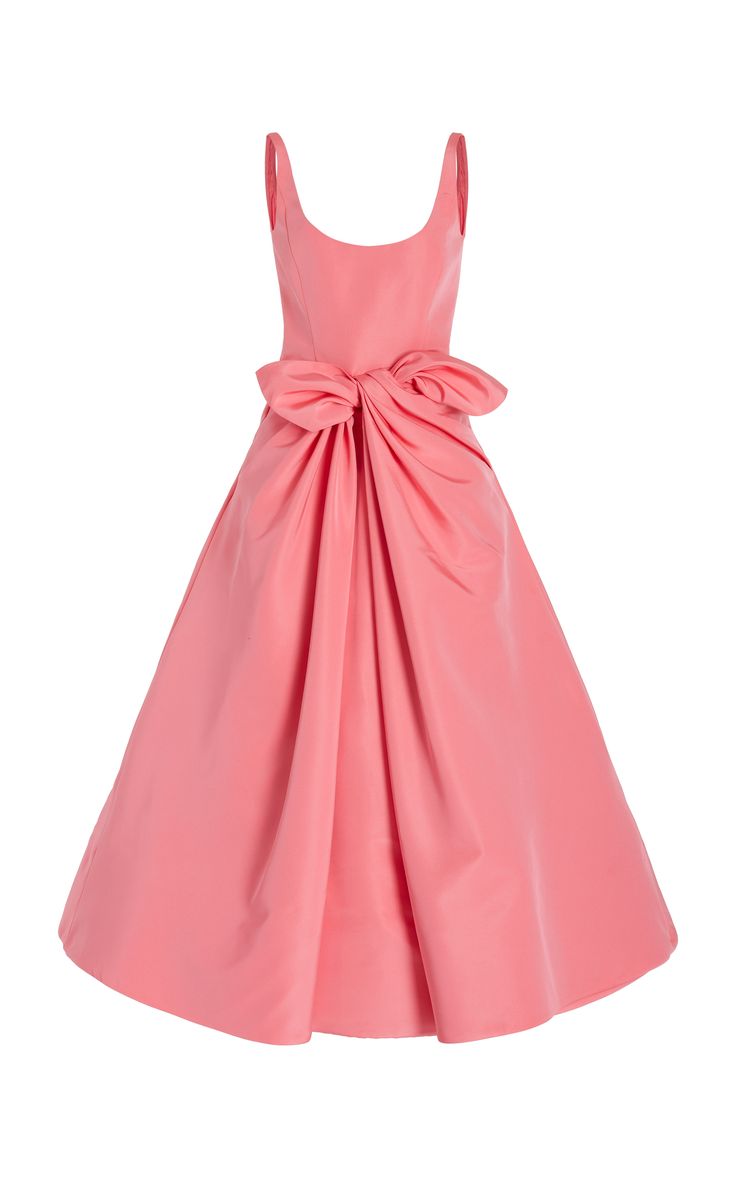 a pink sleeveless dress with a large bow at the waist. the dress is flowing and elegant. it is made of a silky, satinlike material. this dress is perfect for a special occasion or a formal event.