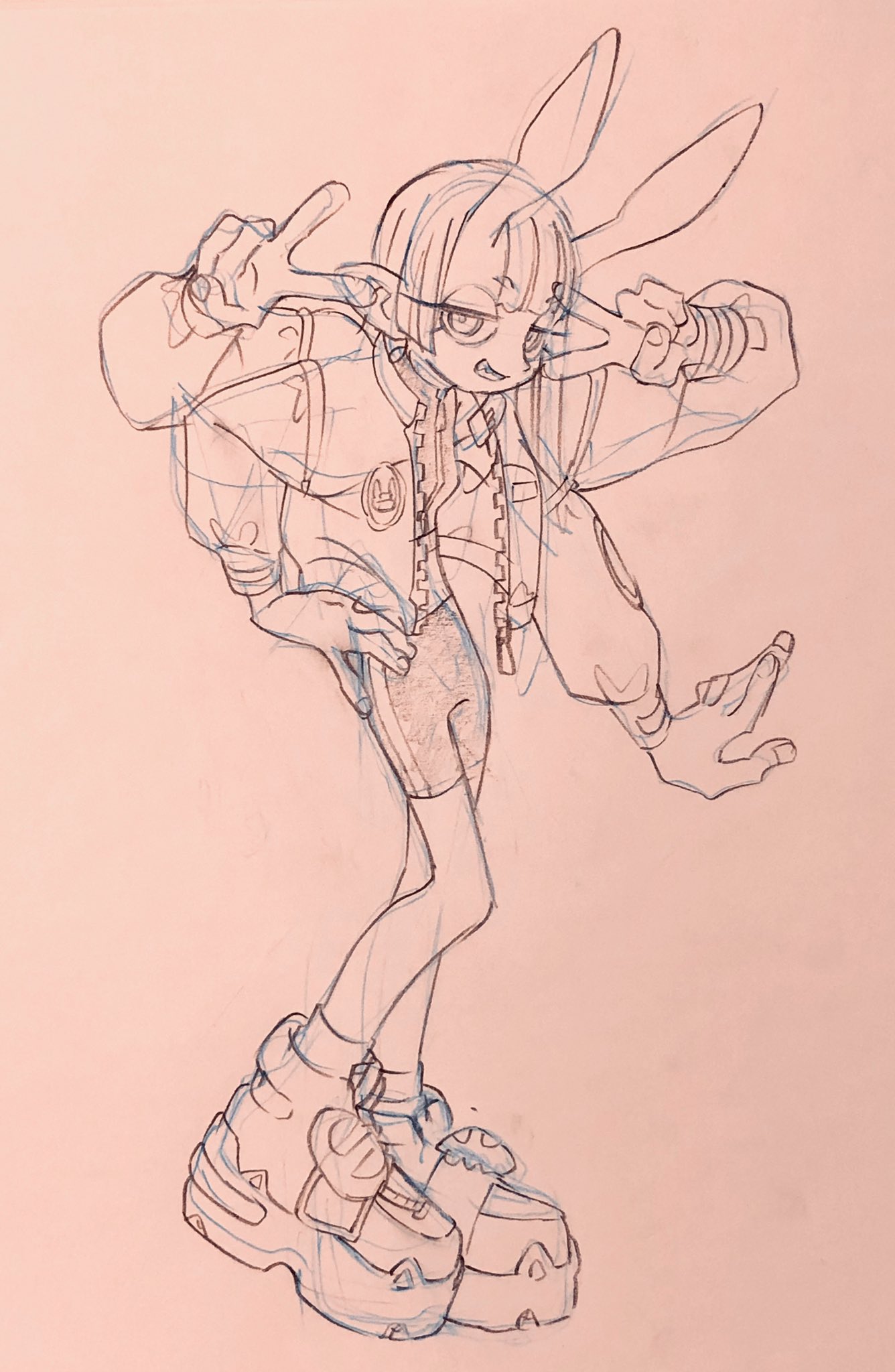 a pencil sketch on pink paper of a person with bunny ears. the character is stylized with exaggerated features and is wearing a bomber jacket, shorts, and chunky sneakers.  the drawing style is reminiscent of anime and manga, with large eyes, a small nose, and a simplified mouth. the character is positioned in a dynamic pose.