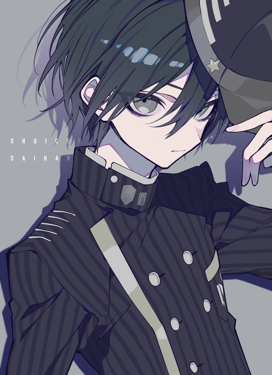 a portrait of the anime character shuichi saihara, wearing his detective uniform, including a striped suit jacket with buttons and a hat with a star. he has dark, messy hair and gray eyes, and a neutral expression. the background is a light gray color. his name is written in capital letters on the left side of the image.
