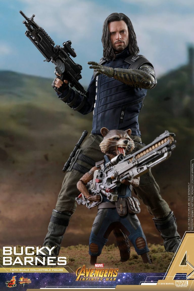 this is a promotional image for a hot toys 1/6 scale collectible figure of bucky barnes from avengers: infinity war.  the figure is shown alongside a rocket raccoon figure.  bucky is posed holding a large machine gun, while rocket is holding a smaller weapon. the background is a blurred landscape. the image also includes the avengers infinity war logo and marvel branding.