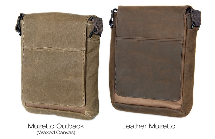 two brown bags side by side. the bag on the left is made of waxed canvas. the bag on the right is made of leather. both bags are brown. both bags have a shoulder strap and a flap closure.  the bag on the left is labeled "muzetto outback (waxed canvas)." the bag on the right is labeled "leather muzetto."