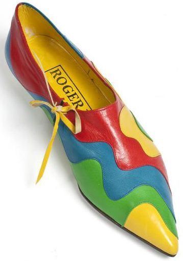 a bright, multicolored pointed toe flat shoe. it's made of leather and has a yellow interior lining. it's from the roger vivier brand. it's a vintage shoe.