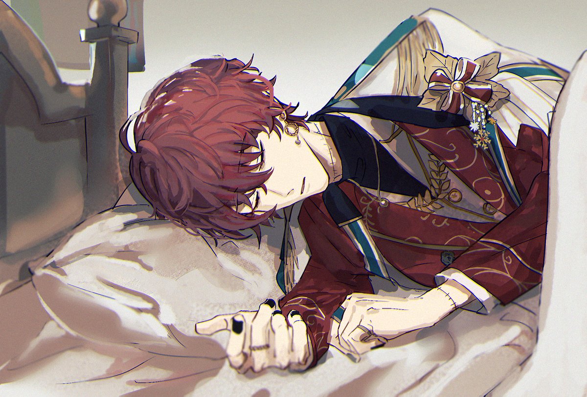 the image is an anime illustration of a young man with red hair and dark skin. he is wearing a red jacket with gold trim and is sleeping on a bed with white sheets and a pillow. he has black nail polish on his nails and is wearing a ring on one finger. his eyes are closed and he looks peaceful. the background is a blurred out image of a wooden headboard.