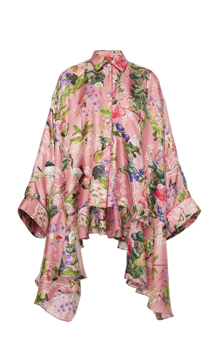 a pink, longsleeved buttondown shirt with a floral print is displayed on a white background. the shirt has a ruffle detail at the bottom.