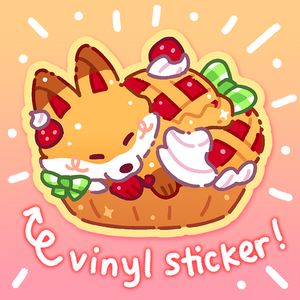 the image is a cute cartoon illustration of a fox nestled inside a strawberry pie. the fox is orange with white fur, and the pie is decorated with whipped cream and green bows. the illustration is surrounded by radiating lines, and the text "vinyl sticker!" is written beneath it.  the overall style is kawaii and whimsical, suggesting a cute character design for a sticker or similar merchandise. the color palette is warm and inviting, with shades of orange, pink, and red dominating the image.