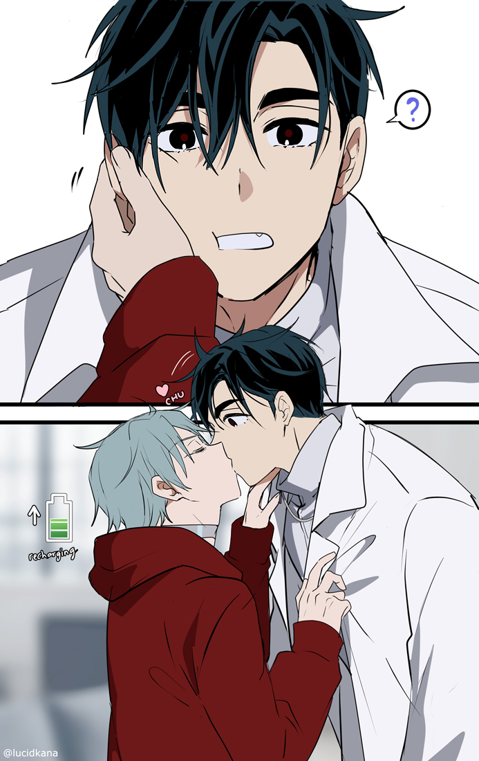 the image features two anime boys. the one in the upper panel is a darkhaired boy with a lab coat. he is shown surprised and has a