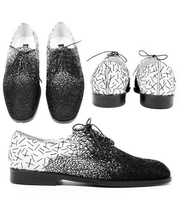 he image showcases a collection of stylish black and white oxfords.  there are two pairs of identical shoes. one pair features a blacktowhite ombre effect with a scribbled pattern, while the second pair is presented with only the white portion of the design visible.  a third pair of shoes shows the completed design on a single shoe, featuring a gradient transition from white scribbles to a solid black scribble pattern. all shoes are laceup oxfords, exhibiting a sophisticated and fashionable design. the background is plain white, highlighting the shoes' details.