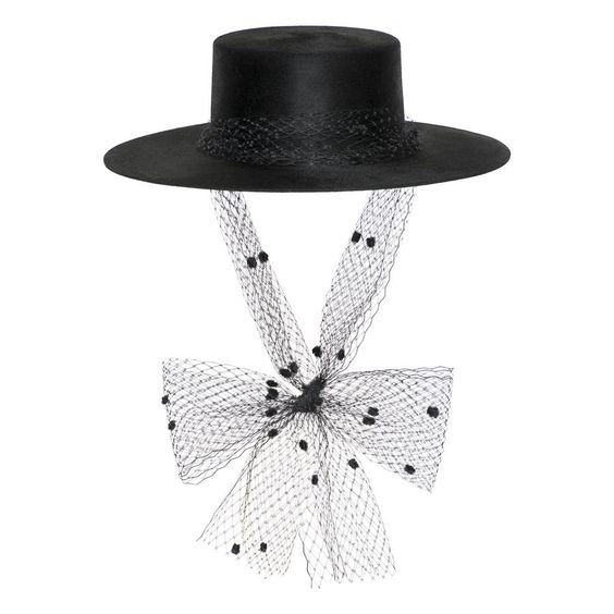 the image shows a black boater hat adorned with a black veil featuring polka dots. the veil is tied in a bow at the back of the hat. the hat and veil are both made of a delicate, seemingly soft material. the overall style is elegant and sophisticated. the background is plain white, allowing the hat and veil to be the clear focus.