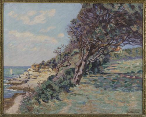 the image shows a landscape painting. the scene depicts a coastal area with a cliff on the left side. a path leads along the edge of the cliff. the sea is visible with a sailboat in the distance. the sky is light blue with some clouds. on the right side of the painting, there is a grassy area with large trees and dense foliage. in the background, a glimpse of a building can be seen. the painting is framed. the overall style of the painting suggests impressionism with visible brushstrokes and a focus on capturing the natural light and atmosphere.