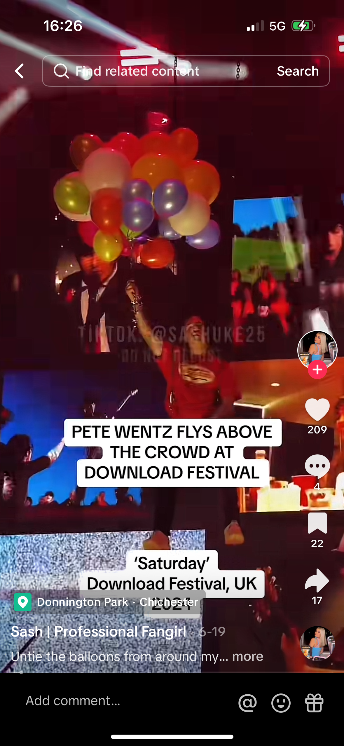 this is a video from the tiktok account of @sashuke25, showing pete wentz of the band fall out boy singing during a download festival performance at donnington park in the uk. it appears to be from the 2021 festival, and the video is captioned, "pete wentz flies above the crowd at download festival." in the background, there are several balloons that are either held by fans or being thrown towards the crowd.