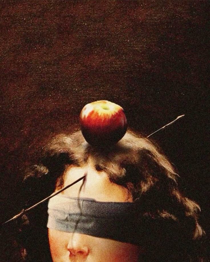 a painting depicts a blindfolded woman with an apple on her head. an arrow pierces through the apple. the background is dark. it appears to be a reference to the william tell folklore.