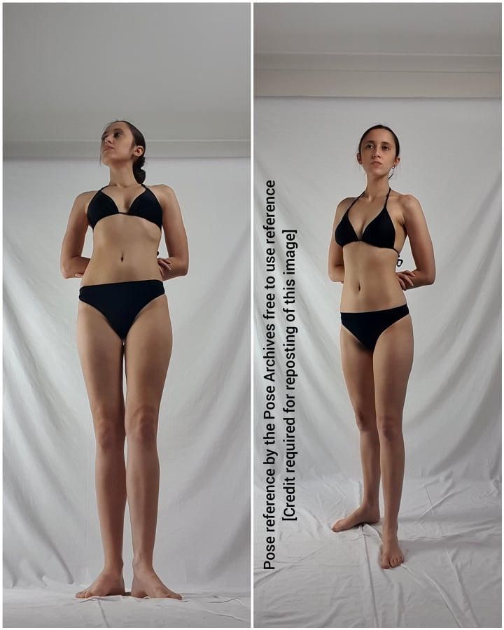 this is a photo of a woman standing in a black bikini against a white background. the woman is posing in a neutral stance. this image could be used as a reference for artists drawing or painting a female figure.