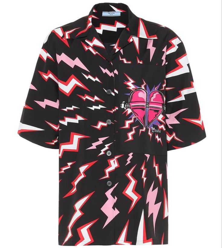a shortsleeved buttondown shirt with an allover lightning bolt pattern and a heart graphic on the chest pocket. the shirt features a camp collar and is buttoned down the front. the pattern consists of red, pink, and white lightning bolts on a black background. the heart graphic on the chest pocket is a stylized pink heart with a silver bar across it and "prada" written below it. the shirt has a casual and playful style.