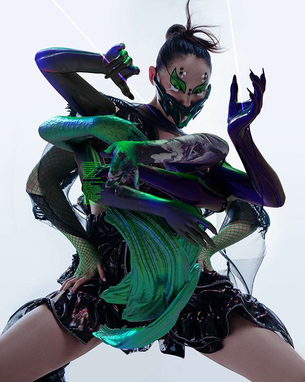 a woman with green eyes, a black mask, and green and blue makeup is posing in a futuristic outfit. her body is surrounded by abstract green and blue shapes, creating a surreal and cyberpunk look.