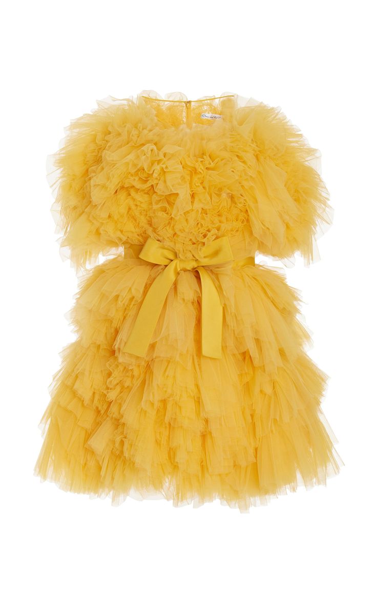a bright yellow, kneelength dress with multiple layers of tulle ruffles and a matching ribbon bow tied at the waist. the dress features short, ruffled sleeves and a fluffy, textured appearance.