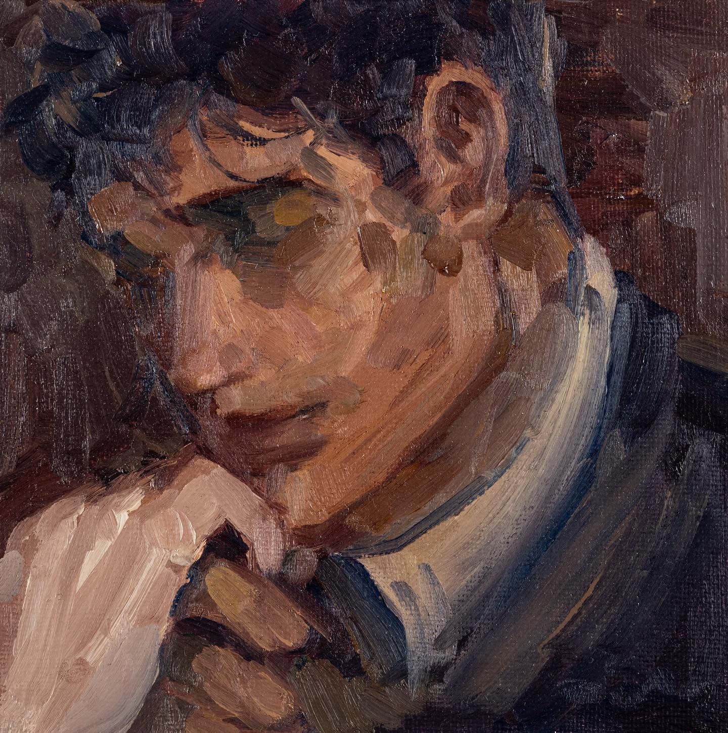 this oil painting is a closeup portrait of a man. his face is turned slightly away from the viewer, and his eyes are closed. his hand is resting on his chin, and his lips are slightly parted. he appears to be lost in thought, perhaps contemplating something deeply. the painting is done in a realistic style with thick brushstrokes and a muted color palette. there is a strong sense of shadow and light, which adds to the moodiness of the piece. the overall impression is one of contemplation and introspection, with a hint of melancholy.