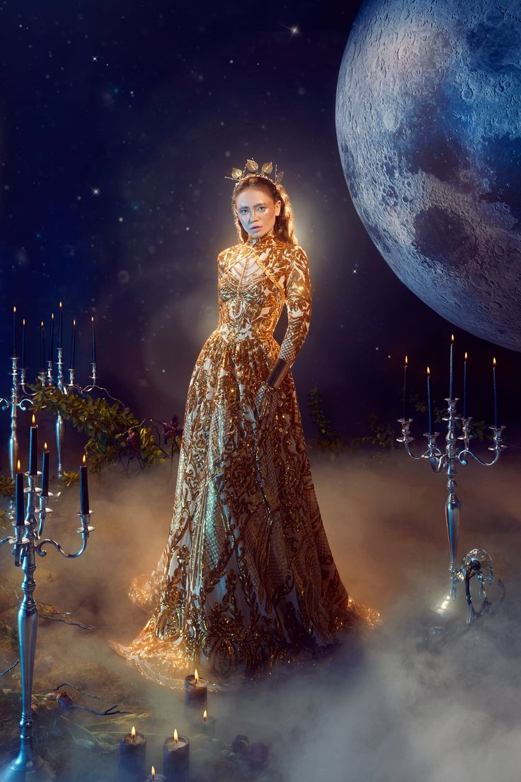a woman in a gold glitter gown stands in a mystical setting. she is surrounded by candles and candelabras, and the moon is visible in the night sky behind her. the setting is dark and mysterious, and the woman's beauty is ethereal and magical.