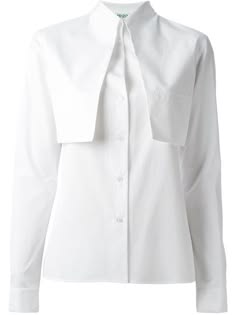 a white, longsleeved, buttondown shirt with a collar and a foldedover design in the front. the shirt is a minimalist design and appears to be made of a lightweight fabric.