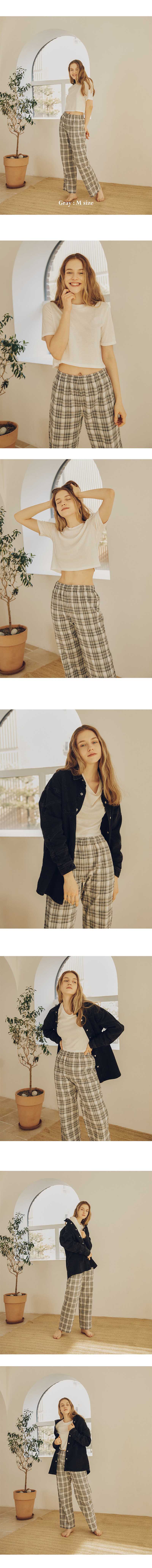 the image shows a woman in different poses and outfits in an indoor setting. she wears plaid pants in each shot, paired with different tops and blazers. the background includes a plant in a pot and a window.